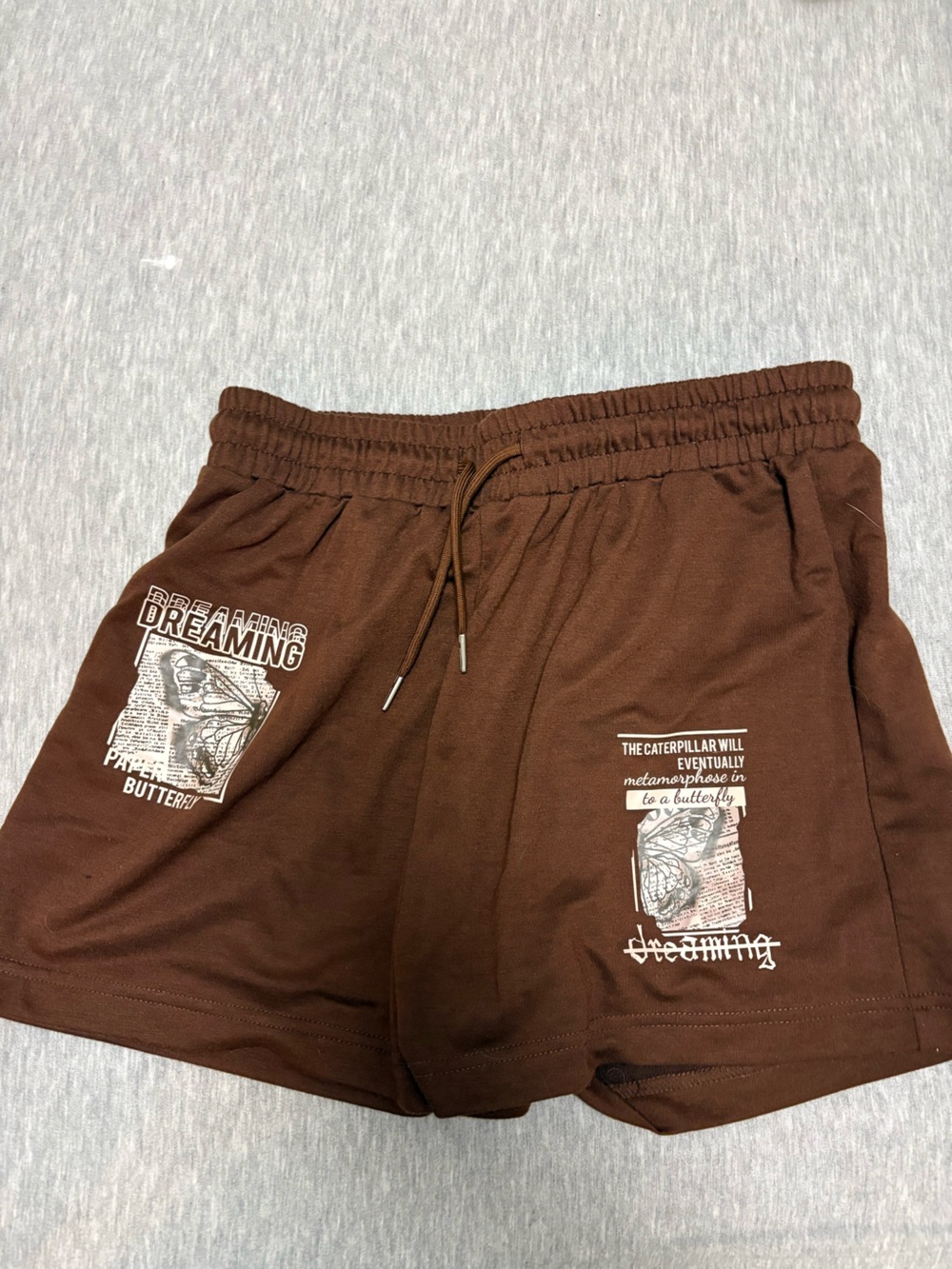 Brown H&M shorts with butterflies